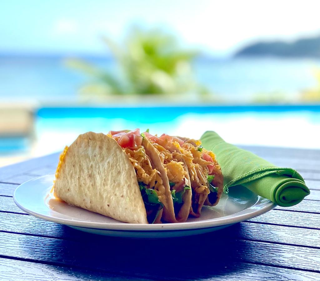 Taco Tuesday at Pagua Bay Bar & Grill, poolside dining with a day pass in Marigot, Dominica