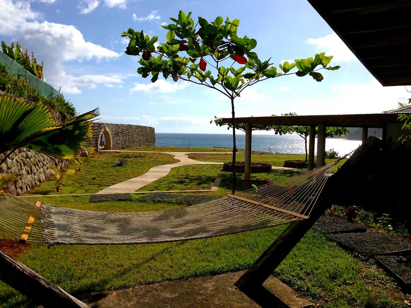 Hammock on a private terrace at Pagua Bay House, overlooking the Atlantic in Marigot, Dominica