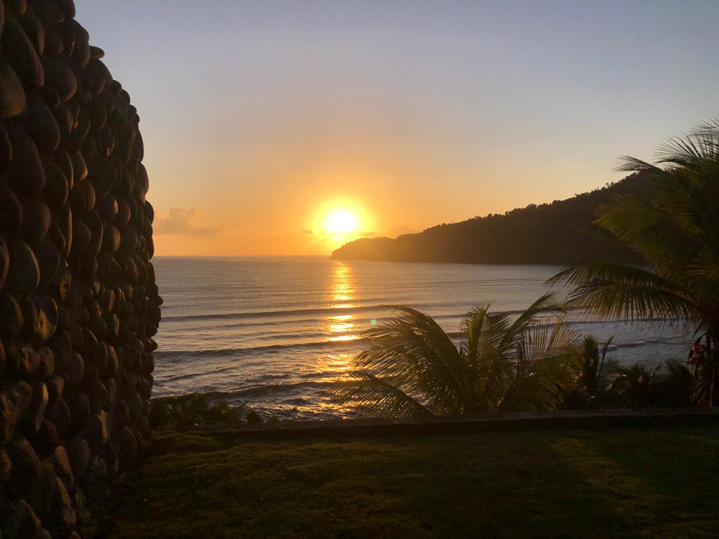 Sunrise over the Atlantic seen from the lawn at Pagua Bay House, Dominica