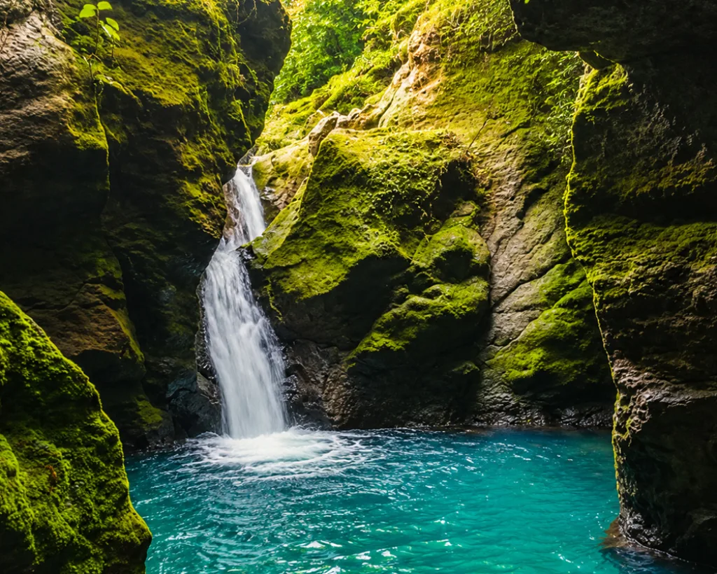 Waterfall in the narrow rock canyon at Titou Gorge, Dominica